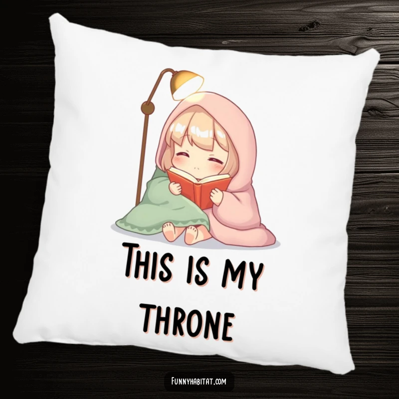 Funny pillow with a cozy character wrapped in a blanket, reading a book by soft lamplight, perfect for relaxation.