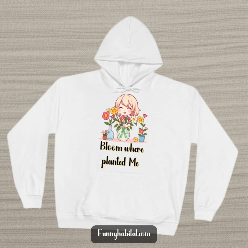 Funny hoodie with a happy character arranging a beautiful bouquet of colorful flowers in a vase, perfect for cozy days.
