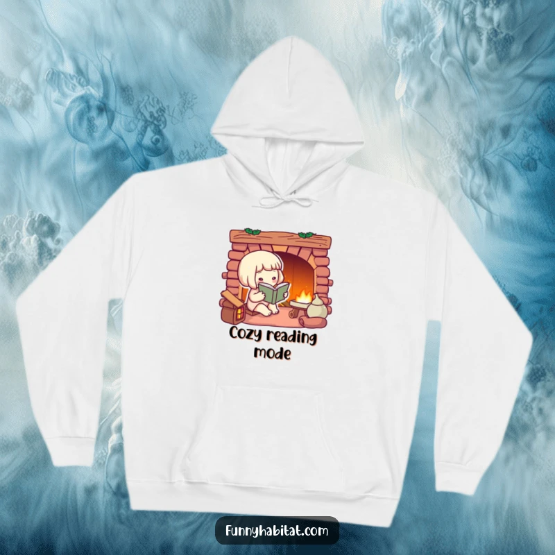 Funny hoodie showing a character reading a large book by a warm, inviting fireplace, perfect for cozy nights.
