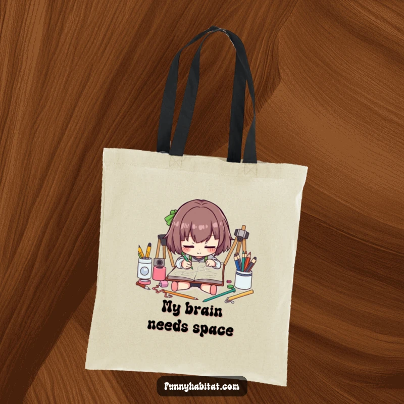 Funny artist tote bag featuring a character sketching intently, a great way to carry art supplies with a humorous touch.